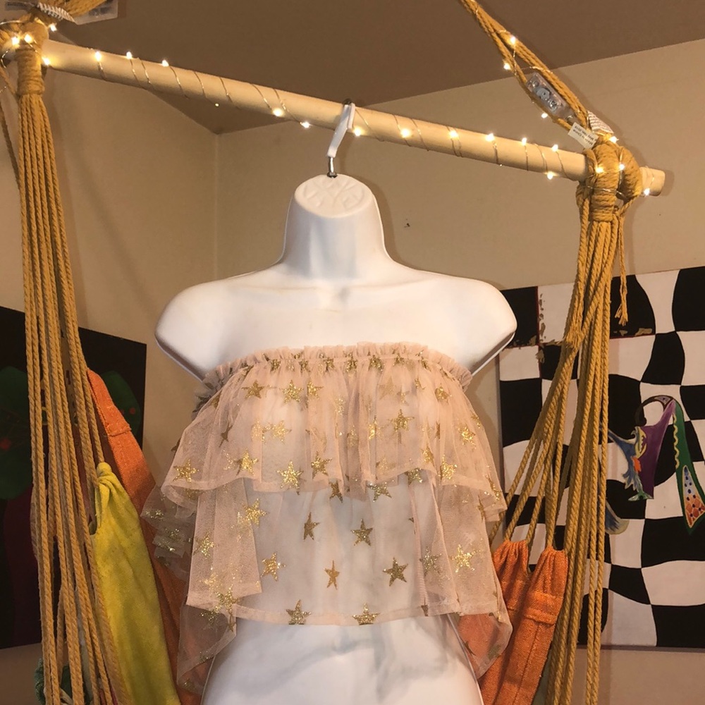 Off shoulder sheer top with gold glitter stars